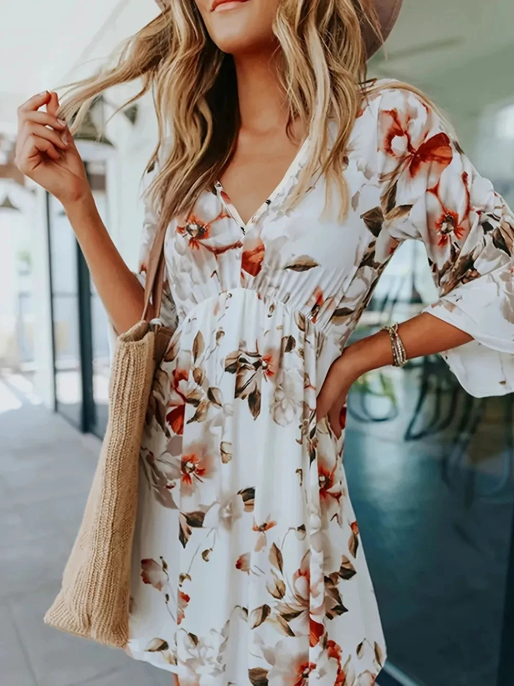 Floral V-Neck Three-Quarter Sleeve Mini Dress by Trendsi