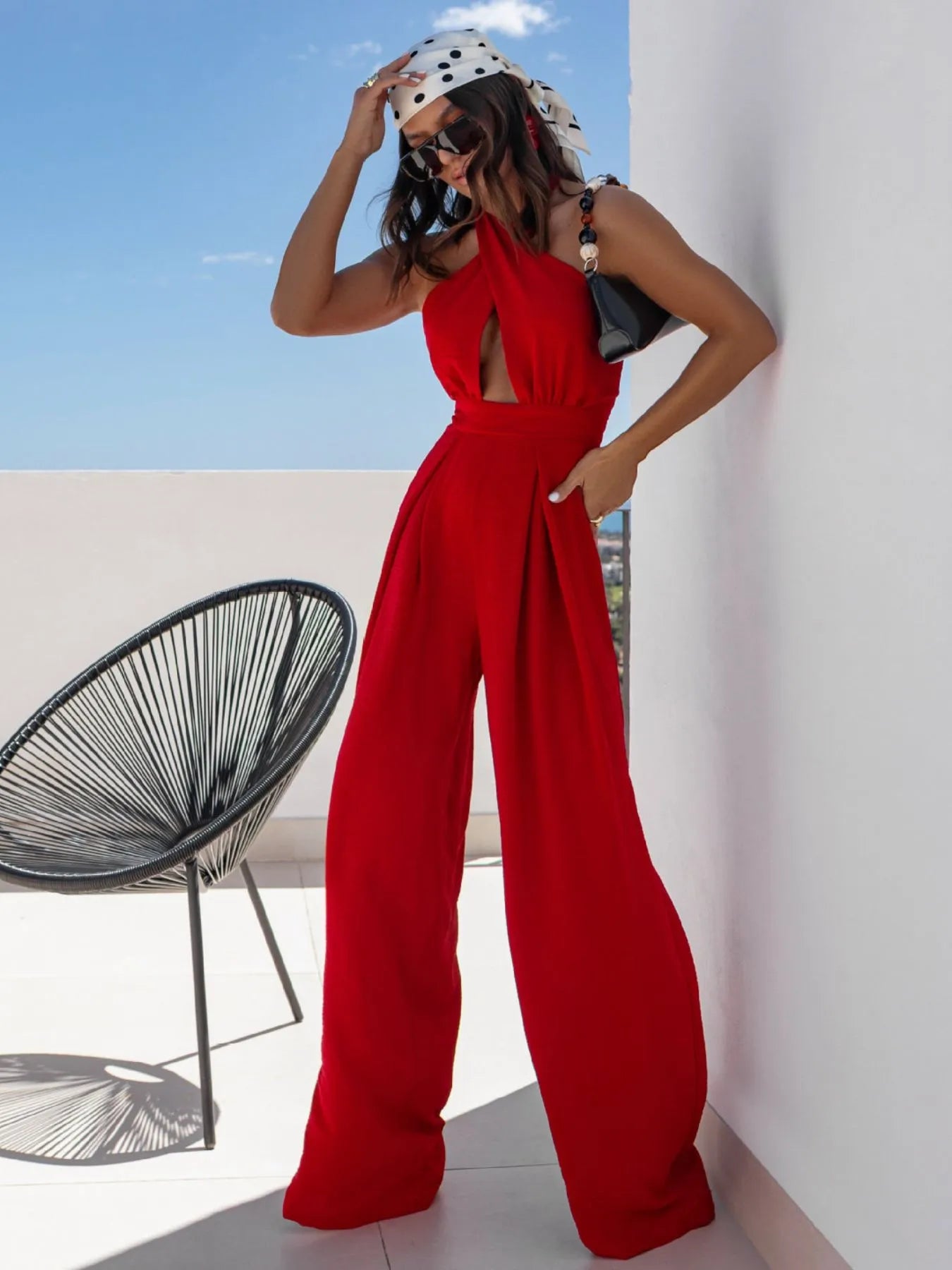 Wide Leg Cutout Halter Neck Jumpsuit by Trendsi