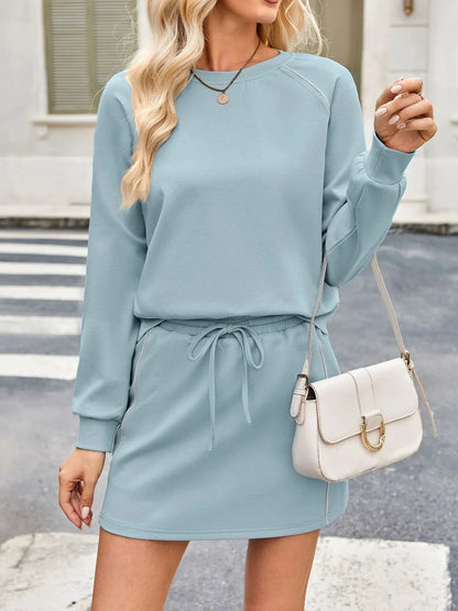 Round Neck Raglan Sleeve Top and Skort Set by Trendsi