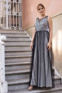 ATENEA MAXI BLACK/SILVER dress with silver sequin bodice and gray tulle skirt; exterior and filling 100% polyester.